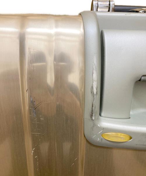 ZERO HALLIBURTON（ゼロ ハリバートン）ZERO HALLIBURTON (ゼロハリバートン) ゼローラ・スーター 2輪キャリー シャンパンゴールドの古着・服飾アイテム