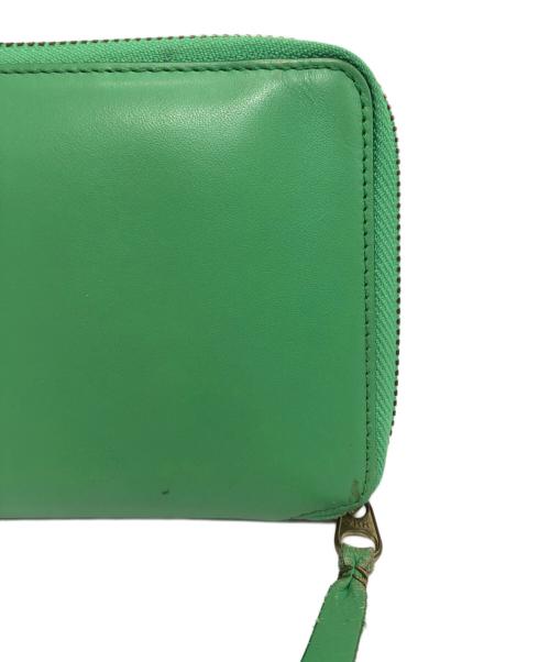 COMME des GARCONS（コムデギャルソン）COMME des GARCONS (コムデギャルソン) 2つ折り財布 グリーンの古着・服飾アイテム