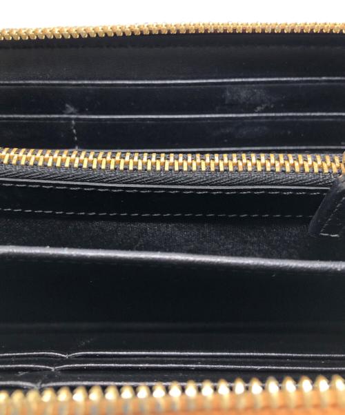 MCM（エムシーエム）MCM (エムシーエム) ロゴプリントラウンドファスナーウォレット ブラウンの古着・服飾アイテム