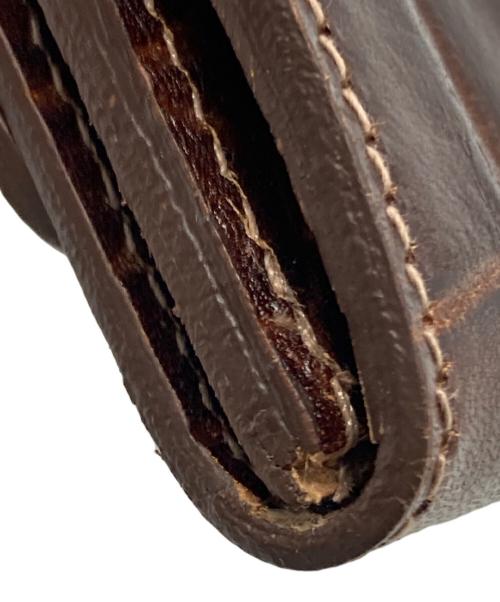 IL BISONTE（イル ビゾンテ）IL BISONTE (イル ビゾンテ) クロコエンボス ワンスナップ2つ折りウォレット ブラウンの古着・服飾アイテム