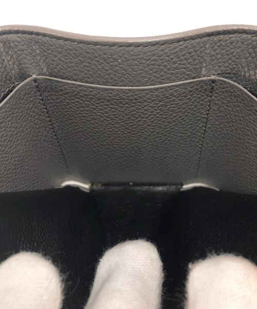 Saint Laurent Paris（サンローランパリ）Saint Laurent Paris (サンローランパリ) コンパクトウォレット ベージュの古着・服飾アイテム