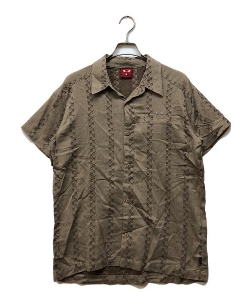 OAKLEY（オークリー）OAKLEY (オークリー) スカルデザイン半袖シャツ ブラウン サイズ:Sの古着・服飾アイテム