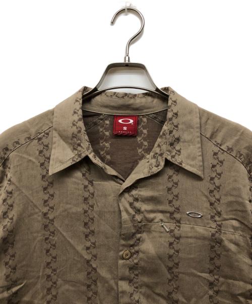 OAKLEY（オークリー）OAKLEY (オークリー) スカルデザイン半袖シャツ ブラウン サイズ:Sの古着・服飾アイテム