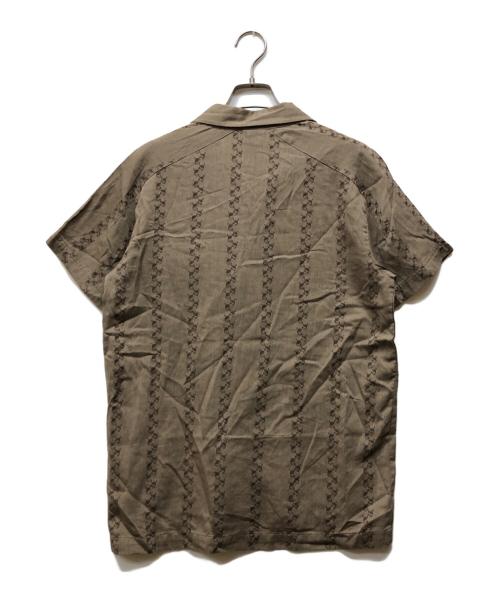 OAKLEY（オークリー）OAKLEY (オークリー) スカルデザイン半袖シャツ ブラウン サイズ:Sの古着・服飾アイテム