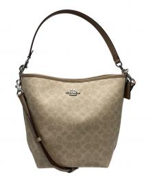 COACH（コーチ）の古着「シティ ラージ バケット バッグ・シグネチャー」｜ベージュ