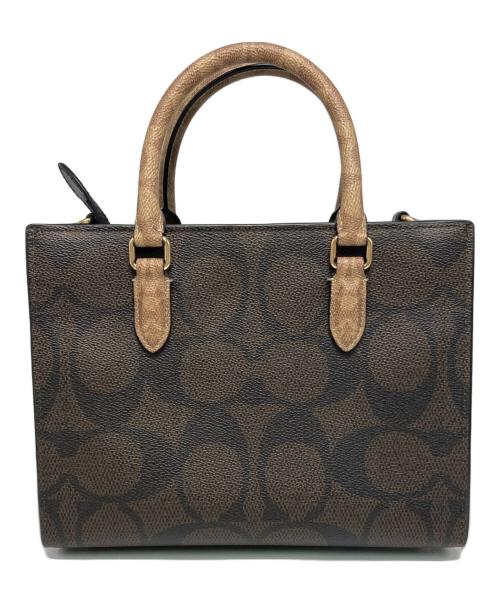 COACH（コーチ）COACH (コーチ) マギー スモール トート・ブロックド シグネチャー キャンバス ブラック×ブラウンの古着・服飾アイテム