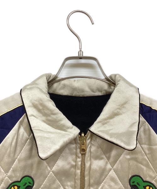 HUMAN MADE（ヒューマンメイド）HUMAN MADE (ヒューマンメイド) REVERSIBLE SOUVENIR JACKET アイボリー×ブラック サイズ:Mの古着・服飾アイテム