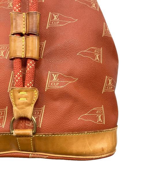 LOUIS VUITTON（ルイ ヴィトン）LOUIS VUITTON (ルイ ヴィトン) 巾着ショルダーバッグ オレンジの古着・服飾アイテム