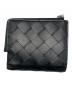 BOTTEGA VENETA（ボッテガベネタ）の古着「イントレチャート 二つ折りファスナーウォレット」｜ブラック