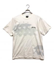 stussy（ステューシー）の古着「サーフマン フェードプリントtシャツ」｜ホワイト
