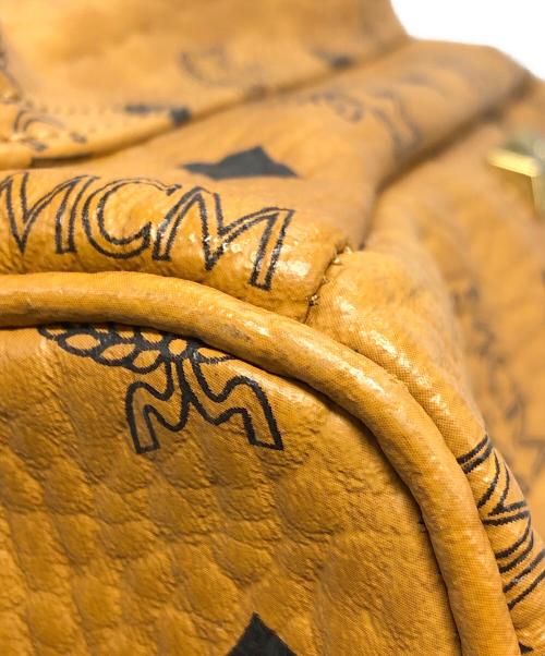 MCM（エムシーエム）MCM (エムシーエム) STARK スタッズバックパック ブラウンの古着・服飾アイテム