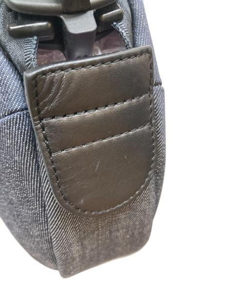 kawa-kawa（カワカワ）kawa-kawa (カワカワ) EAR (イア) デニム丸ビスバッグ ネイビーの古着・服飾アイテム