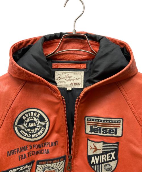 AVIREX（アヴィレックス）AVIREX (アヴィレックス) GOAT A.W.A. PATCHED PARKA オレンジ サイズ:Mの古着・服飾アイテム