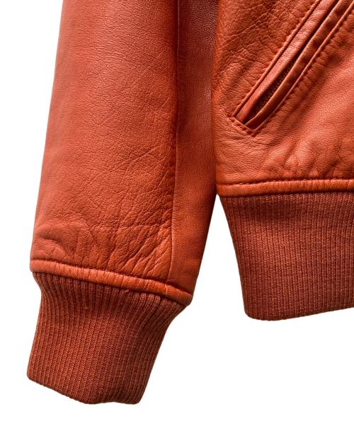 AVIREX（アヴィレックス）AVIREX (アヴィレックス) GOAT A.W.A. PATCHED PARKA オレンジ サイズ:Mの古着・服飾アイテム