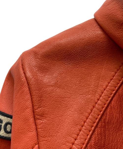 AVIREX（アヴィレックス）AVIREX (アヴィレックス) GOAT A.W.A. PATCHED PARKA オレンジ サイズ:Mの古着・服飾アイテム