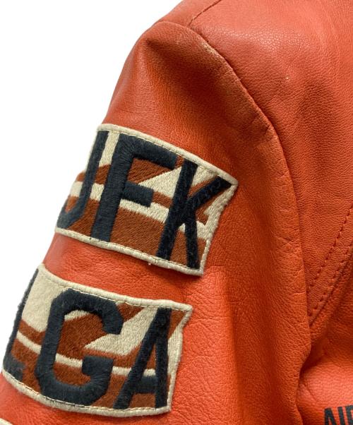 AVIREX（アヴィレックス）AVIREX (アヴィレックス) GOAT A.W.A. PATCHED PARKA オレンジ サイズ:Mの古着・服飾アイテム