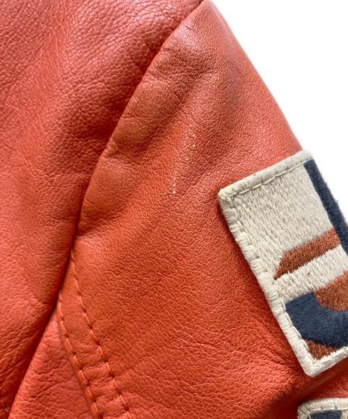AVIREX（アヴィレックス）AVIREX (アヴィレックス) GOAT A.W.A. PATCHED PARKA オレンジ サイズ:Mの古着・服飾アイテム