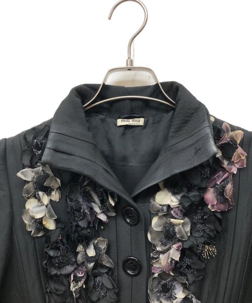MIU MIU（ミュウミュウ）MIU MIU (ミュウミュウ) 10AW フラワーモチーフコート ブラック サイズ:40の古着・服飾アイテム