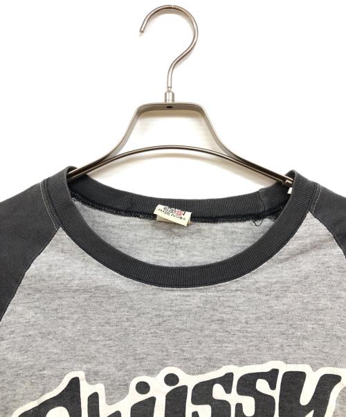 stussy（ステューシー）stussy (ステューシー) ラグランカットソー ブラック×グレー サイズ:Sの古着・服飾アイテム