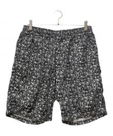 stussy（ステューシー）の古着「総柄スカルハーフパンツ」｜ブラック