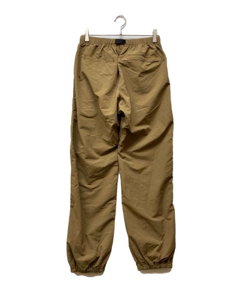 GRAMICCI（グラミチ）GRAMICCI (グラミチ) NYLON TRACK PANT ブラウン サイズ:L 未使用品の古着・服飾アイテム