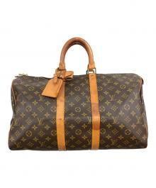 LOUIS VUITTON（ルイ ヴィトン）の古着「トラベルバッグ」｜ブラウン
