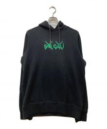 sacai×KAWS（サカイ×カウズ）の古着「Flock Print Hooide」｜ブラック