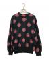 Supreme（シュプリーム）の古着「15FW CROSSES SWEATER」｜ブラック×レッド