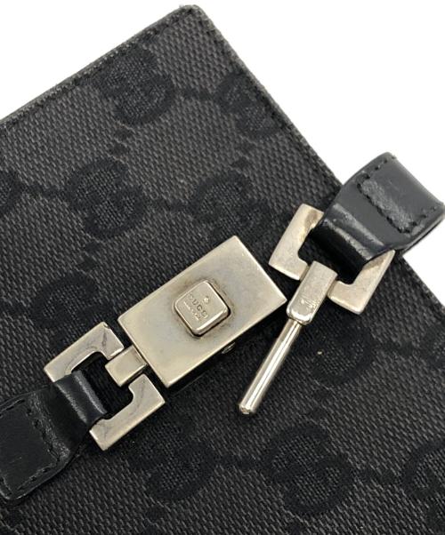 GUCCI（グッチ）GUCCI (グッチ) GGキャンバス２つ折り財布 ブラックの古着・服飾アイテム