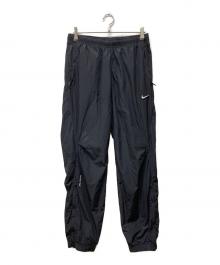 NIKE×NOCTA（ナイキ×ノクタ）の古着「ノクタ ナイロントラックパンツ」｜ブラック