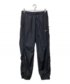 ナイキ NIKE ドレイク ノクタ トラック ナイロンパンツＭ黒 ブラック 中古・古着通販】NIKE (ナイキ) Drake NOCTA (ドレイク ノクタ) 26SS