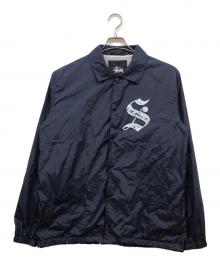 stussy（ステューシー）の古着「ロゴプリントコーチジャケット」｜ネイビー