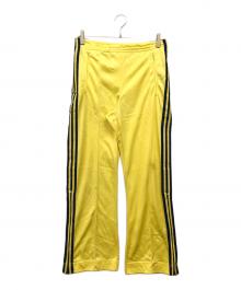 adidas（アディダス）の古着「ATPトラックパンツ」｜イエロー