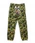 A BATHING APE（アベイシングエイプ）の古着「総柄シャークスウェットロングパンツ」｜グリーン