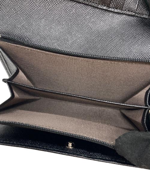 BURBERRY（バーバリー）BURBERRY (バーバリー) エンボスチェック３つ折り財布 ブラックの古着・服飾アイテム