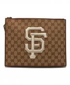 GUCCI×MLBグッチ×エムエルビー）の古着「GGキャンバスクラッチバッグ」｜ブラウン×ベージュ