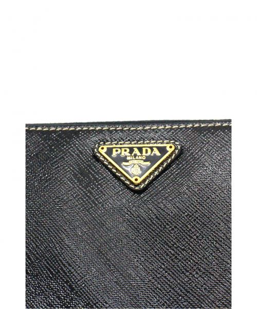 PRADA（プラダ）PRADA (プラダ) ラウンドファスナー長財布 ブラック サイズ:下記参照 SAFFIANO VERNIC 1M0506 程度の古着・服飾アイテム