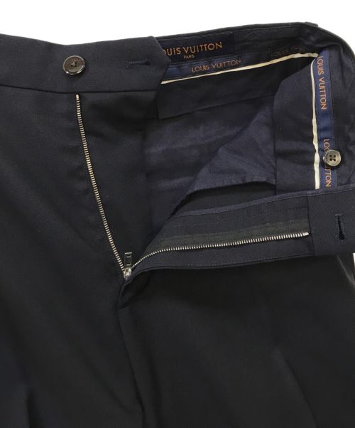 LOUIS VUITTON（ルイ ヴィトン）LOUIS VUITTON (ルイ ヴィトン) スリットフレアスラックス ネイビー サイズ:36の古着・服飾アイテム