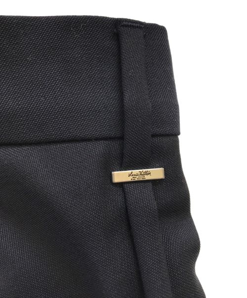 LOUIS VUITTON（ルイ ヴィトン）LOUIS VUITTON (ルイ ヴィトン) スリットフレアスラックス ネイビー サイズ:36の古着・服飾アイテム