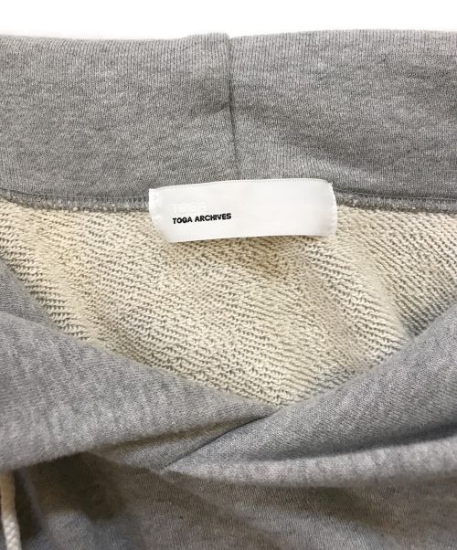 TOGA ARCHIVES（トーガアーカイブス）TOGA ARCHIVES (トーガアーカイブス) HOLE SWEAT HOODIE グレー サイズ:Mの古着・服飾アイテム