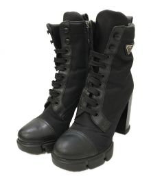 PRADA（プラダ）の古着「Re-Nylon xブラッシュドレザー ブーティー ショートブーツ」｜ブラック