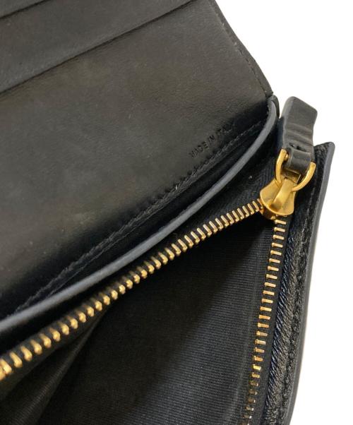 VALENTINO GARAVANI（ヴァレンティノ・ガラヴァーニ）VALENTINO GARAVANI (ヴァレンティノ・ガラヴァーニ) ローマンスタッズ2つ折財布 ブラックの古着・服飾アイテム