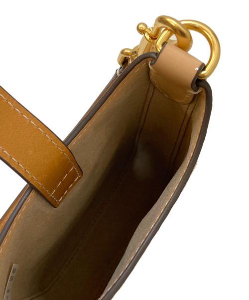 TORY BURCH（トリーバーチ）TORY BURCH (トリーバーチ) エナメル エンボス ショルダーバッグ ベージュの古着・服飾アイテム