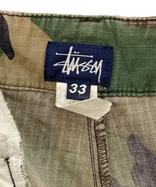 stussy（ステューシー）stussy (ステューシー) カモフラパンツ グリーン サイズ:33の古着・服飾アイテム
