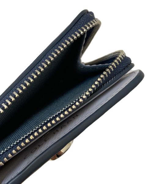 COLE HAAN（コールハーン）COLE HAAN (コールハーン) バイフォ-ルド レザーウォレット ネイビーの古着・服飾アイテム