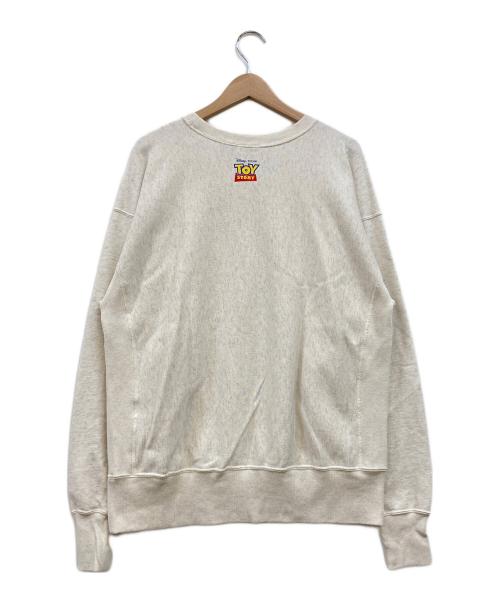 Champion（チャンピオン）Champion (チャンピオン) PIXAR (ピクサー) TOY STORY コラボスウェット アイボリー サイズ:Lの古着・服飾アイテム