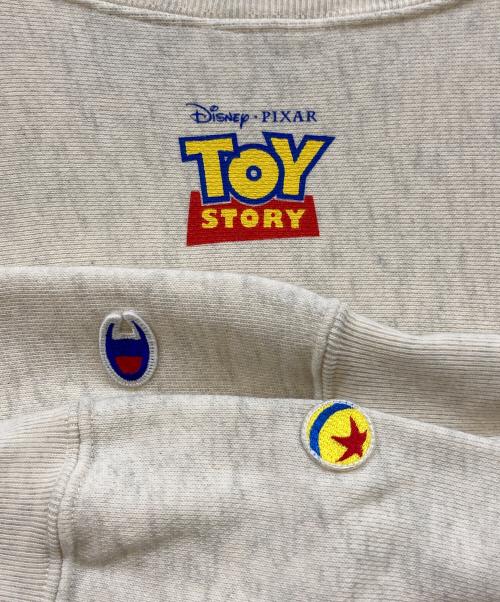 Champion（チャンピオン）Champion (チャンピオン) PIXAR (ピクサー) TOY STORY コラボスウェット アイボリー サイズ:Lの古着・服飾アイテム