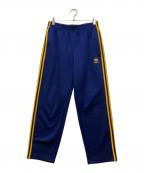 adidasアディダス）の古着「ワイドレッグトラックパンツ」｜ブルー×イエロー