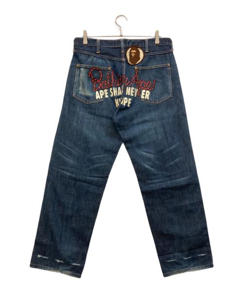 BAPE BY A BATHING APE（ベイプバイアベイシングエイプ）BAPE BY A BATHING APE (ベイプバイアベイシングエイプ) バックペイントデニムパンツ インディゴ サイズ:Lの古着・服飾アイテム