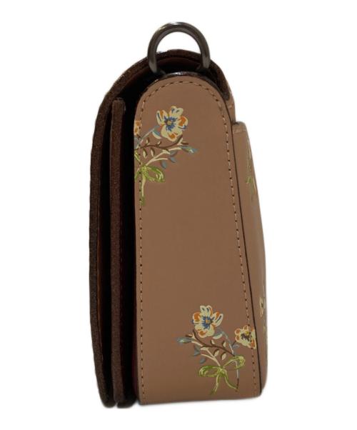 COACH（コーチ）COACH (コーチ) ディンキー グラブタンレザー フラワープリント クロスボディーバッグ ピンクの古着・服飾アイテム